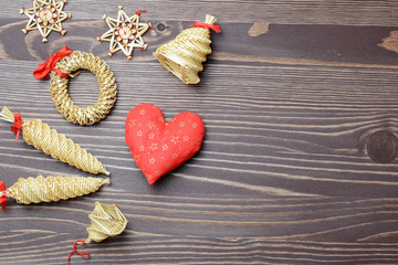 Christmas gift box, food decor and christmas decorations on a dark wooden background. Top view with copy space.