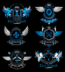 Set of vector retro vintage insignias created with design elements like medieval castles, armory, wild animals, imperial crowns. Collection of coat of arms.