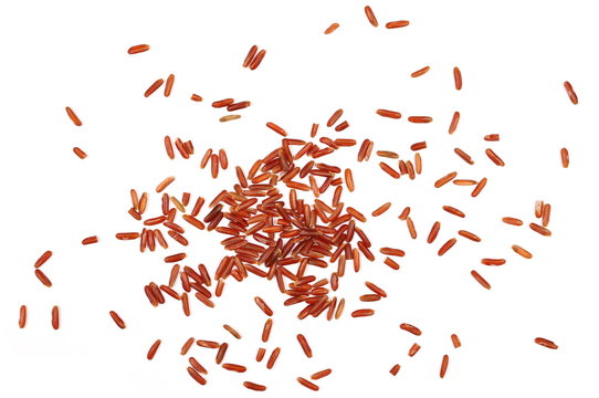 Red wild rice pile isolated on white background, top view