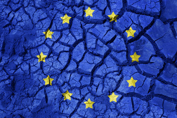 flag of europe on cracked ground background © Syda Productions