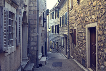 Obraz premium Old town narrow street and ancient houses. Herceg Novi, Montenegro.