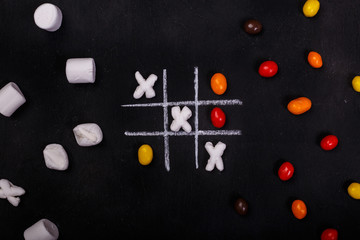 cross zero from marshmallow and coloured candies