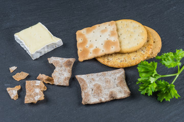 Dry cracker cookies with black background