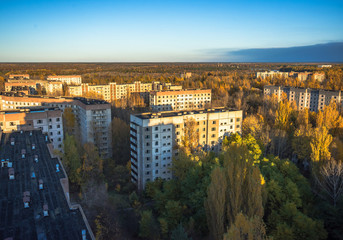Fototapeta premium Aerial view of abandoned Pripyat city in Chernobyl Exclusion Zone at autumn time
