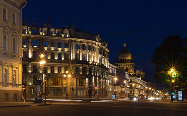 Fototapeta na wymiar Night shot of the beginning of Nevsky and Admiralteysky Prospects, the Saint Isaac's Cathedral or Isaakievskiy Sobor in the city of St. Petersburg, Russia. White nights.