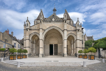 Fototapeta na wymiar France, Burgundy, Beaune: Main entrance of church (Basilica - Collegiale Basilique Notre-Dame de Beaune) in the city center.