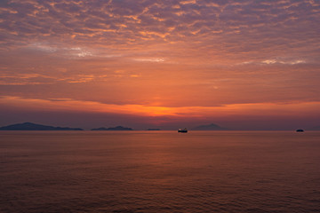Naklejka na ściany i meble Red sunrise over Korean coast