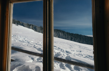 View of a winter landscape scene from the window.