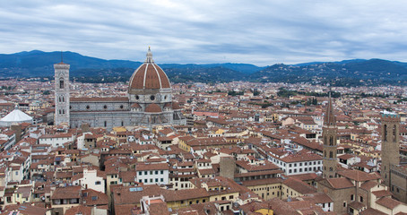 Fototapeta na wymiar Panorama of the city historical center with Cathedral of Saint Mary of the Flowers (Cattedrale di Santa Maria del Fiore), UNESCO World Heritage site. Florence, Tuscany, Italy. A top view.