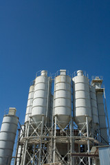 Factory buildings on a background of blue sky