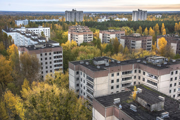 Obraz premium Vew from roof of 16-storied apartment house in Pripyat town, Chernobyl Nuclear Power Plant Zone of Alienation, Ukraine at autumn time