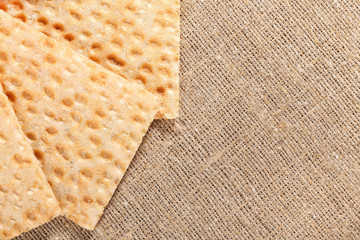 Diet background. Crispbread on the sacking. Still life in rustic style.