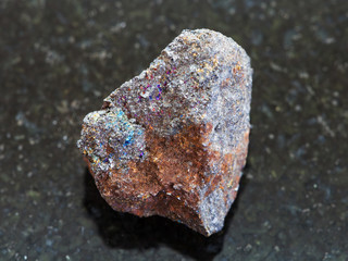 Fototapeta premium raw magnetite (iron ore) stone on dark background