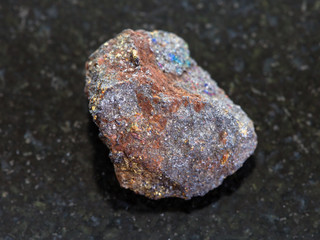 Fototapeta premium magnetite (iron ore) stone on dark background