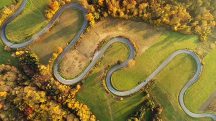 Road in autumn scenery - aerial shot