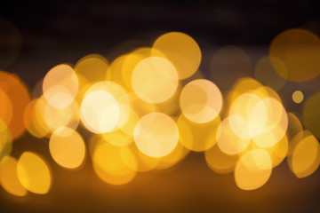 Abstract golden bokeh lights , Christmas background with bokeh festive lights