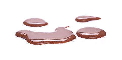 Spilled chocolate milk puddle isolated on white background