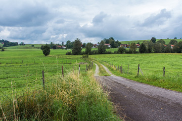 Fototapeta na wymiar The road in Bavarian's fields