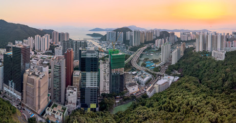 Fototapeta premium Aerial View of a Stunning Sunset over Aberdeen Typhoon Shelter and and Ap Lei Chau district of Hong Kong