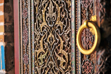 Old wooden doors with arabic pattern