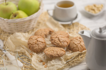 Healthy food & drink natural diet food home cooking: Healthy homemade breakfast. Tea, apple & bakery. Tea, apple and cookie.