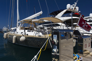 Luxury yachts in Porto Montenegro, prestigious shopping village and yacht port