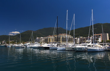 Luxury yachts in Porto Montenegro, prestigious shopping village and yacht port