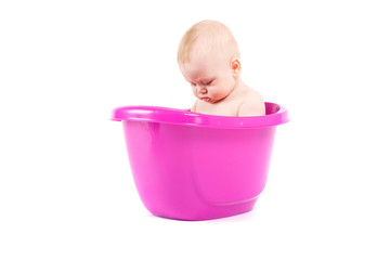 happy cute baby boy take bath in tub
