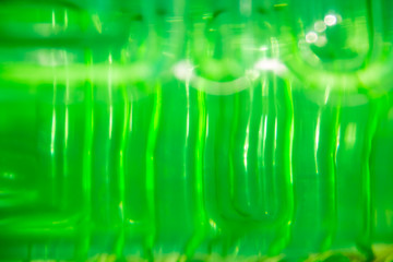 green plastic texture background close up.green transparent texture. Abstract background and...