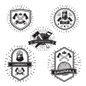 Badges with elements of a lumberjack and sawmill isolated on white . Vector .