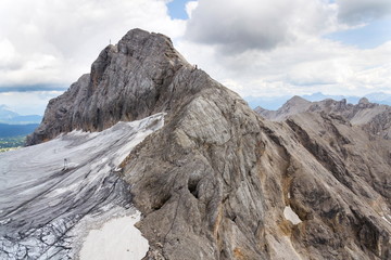 People climbing via Koppenkarstein ferrata near Dachstein glacier, Austrian Alps