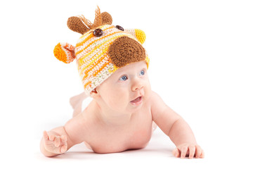 cutie little boy in white diaper and deer hat
