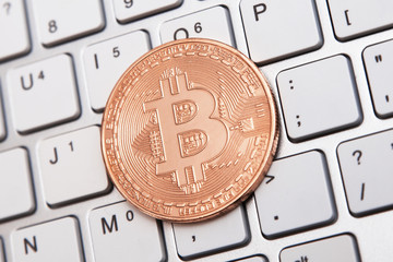 coin bitcoin on the keyboard
