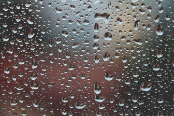 Rain drops on window glass , rainy day