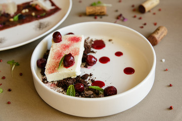 cake with cherries on background
