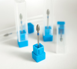 Burs for podiatry, diamond nail drill bits flame form. Medical instrument.