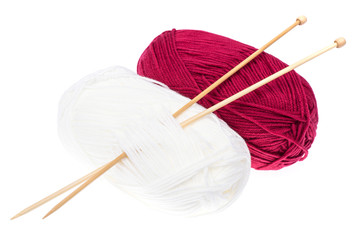 Skeins of thread and knitting wooden needles for needlework