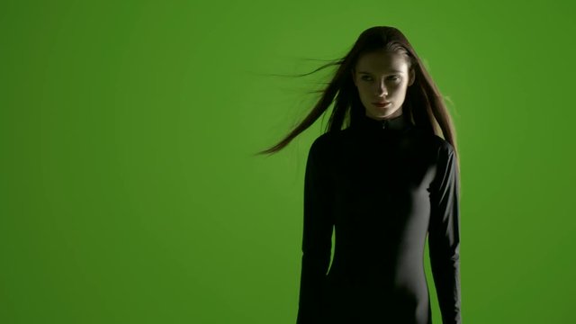 Young stylish fashion model shoot in professional studio over a green screen - shoot with blacmagic urssa mini in prores