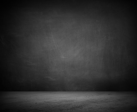 Empty concrete floor and black board wall background. Copy space