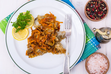 Fish with vegetable marinade