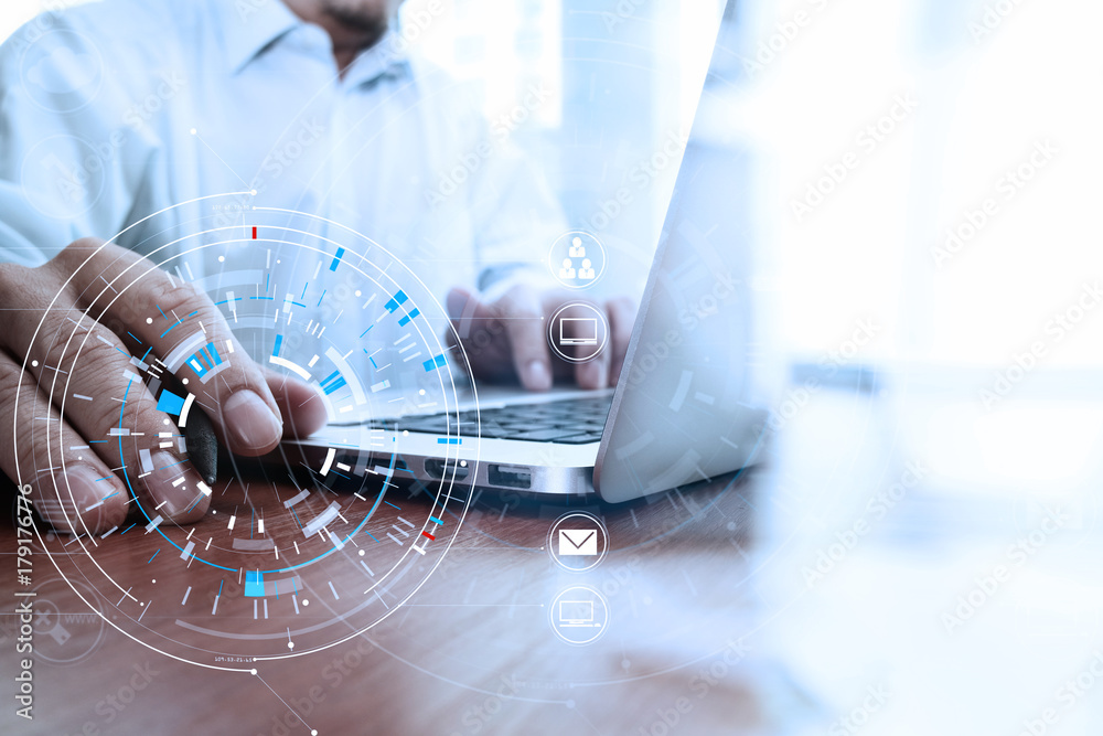 Poster businessman hand working with modern laptop computer in modern office with virtual icon diagram
