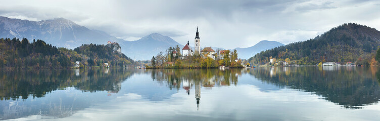 Fototapeta na wymiar panorama with church on the iseland in Slovenia