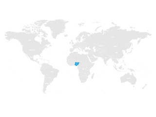 Fototapeta na wymiar Nigeria marked by blue in grey World political map. Vector illustration.