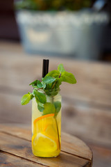 cocktail with melon, lemon and mint