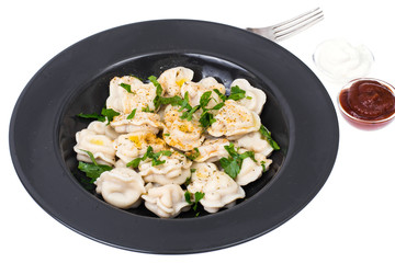 Boiled dumplings in plate on white background