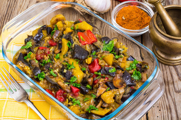 Vegetarian food. Baked mix of vegetables in glass