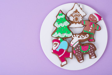 Beautiful and tasty Christmas pastries on bright background
