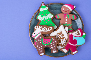 Beautiful and tasty Christmas pastries on bright background