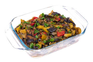 Glass form with baked vegetables. Vegetarian food