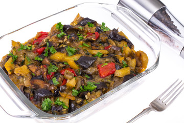 Glass form with baked vegetables. Vegetarian food